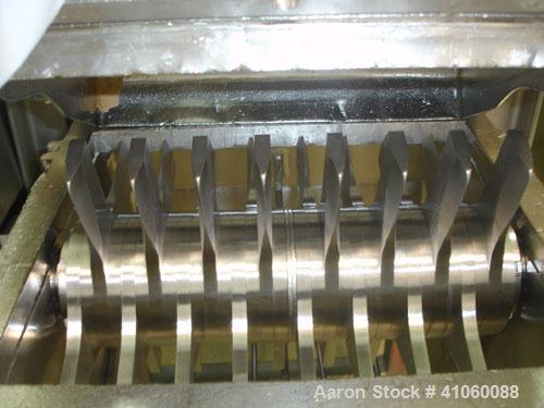 Used Fitzpatrick Fitzmill, Model DKASO 12, stainless steel construction, fixed knives, reversible chamber, gravity feed, 15 hp motor, belt driven, serial #8711.