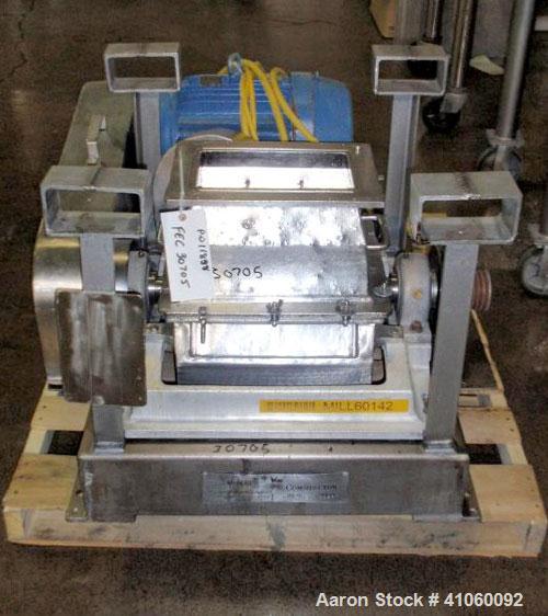 Used Fitzpatrick Fitzmill, Model DKASO12, stainless steel construction, (32) knife/impact fixed knives, reversible chamber, gravity feed, 15 hp motor, belt driven. Mounted on a stainless steel base, ...