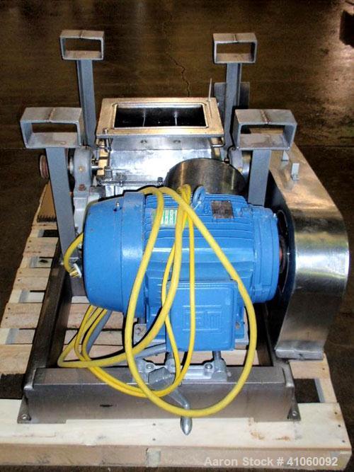Used Fitzpatrick Fitzmill, Model DKASO12, stainless steel construction, (32) knife/impact fixed knives, reversible chamber, gravity feed, 15 hp motor, belt driven. Mounted on a stainless steel base, ...