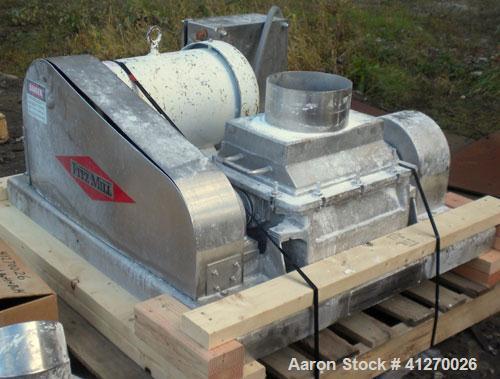 Used Fitzpatrick Fitzmill, Model DKASO12, 316 Stainless Steel. (32) double sided knife fixed 410 stainless steel blades, 11" x 13" cutting chamber, gravity feed hopper, bottom screen with discharge c...