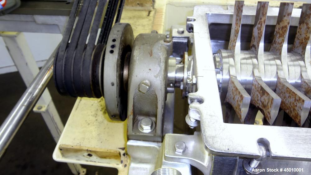 Used Fitzpatrick Fitzmill, Model DKASO12, Stainless Steel.  (32) Impact/knife fixed 410/16/20 stainless steel blades, 11" x 13" 316 stainless steel cutting chamber.  Missing feed throat, bottom scree...