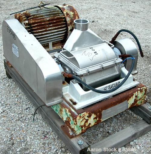 USED: Fitzpatrick Fitzmill, model DKASO12, 304 stainless steel. (32) fixed double impact blades, 11" x 13" cutting chamber, no bottom screen. Forced fed feed throat with a 4" tri clamp opening, water...