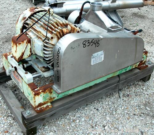 USED: Fitzpatrick Fitzmill, model DKASO12, 304 stainless steel. (32) fixed double impact blades, 11" x 13" cutting chamber, no bottom screen. Forced fed feed throat with a 4" tri clamp opening, water...