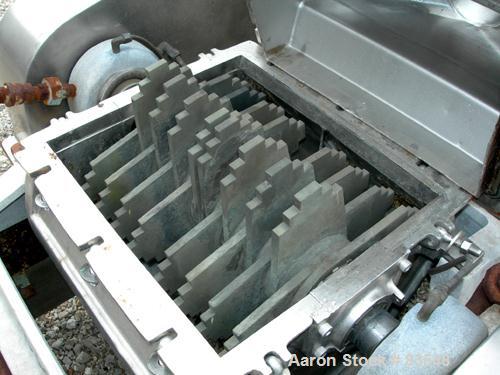 USED: Fitzpatrick Fitzmill, model DKASO12, 304 stainless steel. (32) fixed double impact blades, 11" x 13" cutting chamber, no bottom screen. Forced fed feed throat with a 4" tri clamp opening, water...