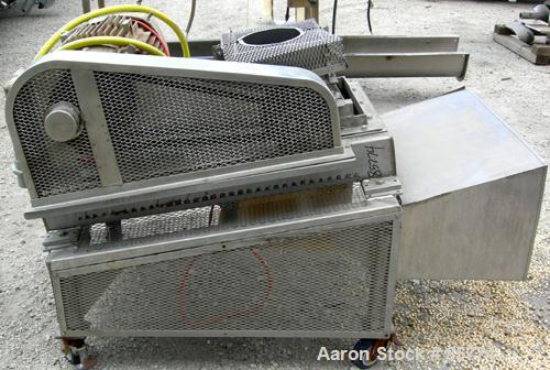 Used Fitzpatrick Fitzmill, Model DKASO12, 304 Stainless Steel. (32) Fixed double hook knife blades, 410 stainless steel. 13" x 11" cutting chamber, modified feed throat. Driven by a 25 HP, 3/60/460 V...