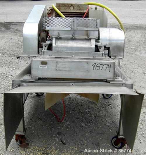 Used Fitzpatrick Fitzmill, Model DKASO12, 304 Stainless Steel. (32) Fixed double hook knife blades, 410 stainless steel. 13" x 11" cutting chamber, modified feed throat. Driven by a 25 HP, 3/60/460 V...