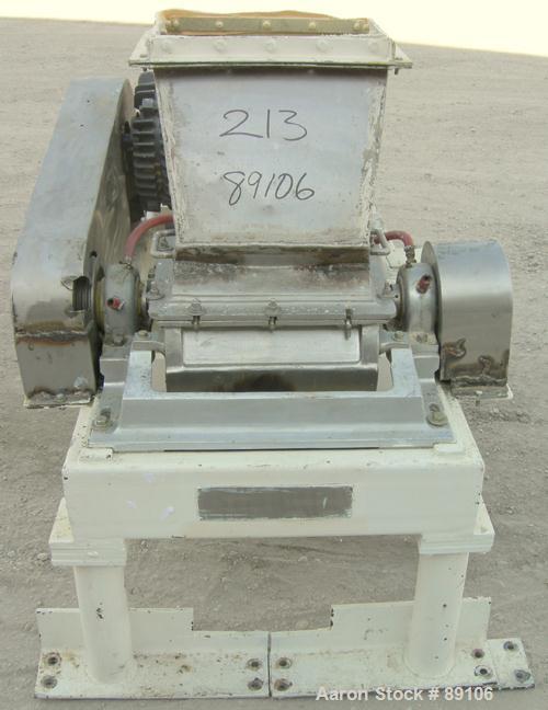 Used Fitzpatrick Fitzmill, Model DKASO12, 316 Stainless Steel. (32) 410 Stainless steel fixed impact blades. 13" x 11" cutting chamber with gravity feed throat and bottom screen. Water cooled bearing...