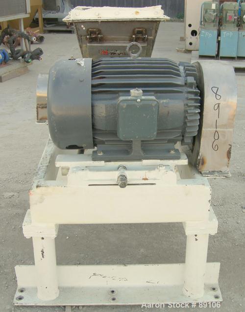 Used Fitzpatrick Fitzmill, Model DKASO12, 316 Stainless Steel. (32) 410 Stainless steel fixed impact blades. 13" x 11" cutting chamber with gravity feed throat and bottom screen. Water cooled bearing...