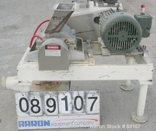USED: Fitzpatrick Fitzmill, model DKASO12, 316 stainless steel. (32) 410 stainless steel fixed impact blades. 13" x 11" cutting chamber with gravity feed throat and bottom screen. Water cooled bearin...
