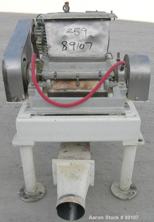 USED: Fitzpatrick Fitzmill, model DKASO12, 316 stainless steel. (32) 410 stainless steel fixed impact blades. 13" x 11" cutting chamber with gravity feed throat and bottom screen. Water cooled bearin...