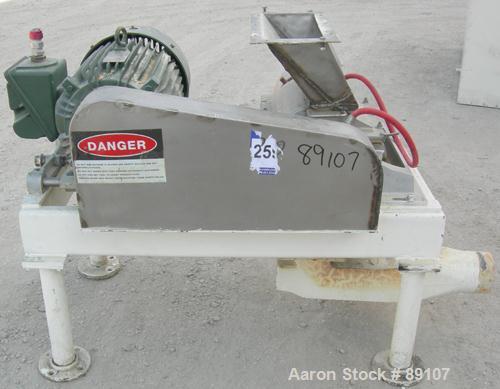 USED: Fitzpatrick Fitzmill, model DKASO12, 316 stainless steel. (32) 410 stainless steel fixed impact blades. 13" x 11" cutting chamber with gravity feed throat and bottom screen. Water cooled bearin...