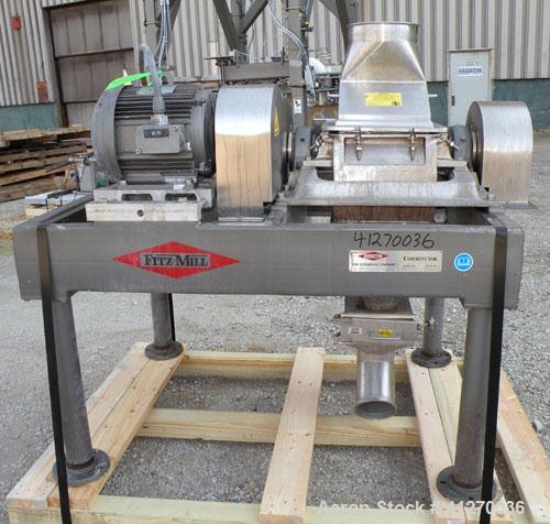 Used Fitzpatrick Fitzmill, Model FASO12, 316 Stainless Steel. (24) Double knife fixed 410 stainless steel blades, 11" x 13" cutting chamber, gravity feed hopper, bottom screen with a  discharge chute...