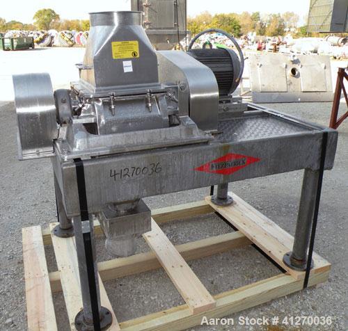Used Fitzpatrick Fitzmill, Model FASO12, 316 Stainless Steel. (24) Double knife fixed 410 stainless steel blades, 11" x 13" cutting chamber, gravity feed hopper, bottom screen with a  discharge chute...