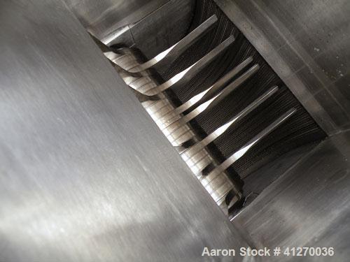 Used Fitzpatrick Fitzmill, Model FASO12, 316 Stainless Steel. (24) Double knife fixed 410 stainless steel blades, 11" x 13" cutting chamber, gravity feed hopper, bottom screen with a  discharge chute...