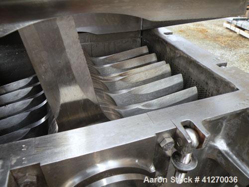 Used Fitzpatrick Fitzmill, Model FASO12, 316 Stainless Steel. (24) Double knife fixed 410 stainless steel blades, 11" x 13" cutting chamber, gravity feed hopper, bottom screen with a  discharge chute...