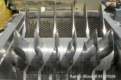 Used Fitzpatrick Fitzmill, Model FASO12, stainless steel. (24) double impact fixed 410 stainless steel blades, 11" x 13", 316 stainless steel cutting chamber, 304 stainless steel gravity feed throat ...