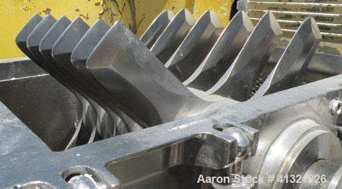 Used Fitzpatrick Fitzmill, Model FASO12, stainless steel. (24) double impact fixed 410 stainless steel blades, 11" x 13", 316 stainless steel cutting chamber, 304 stainless steel gravity feed throat ...