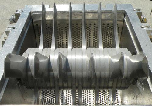 Used Fitzpatrick Fitzmill, Model FASO12, stainless steel. (24) double impact fixed 410 stainless steel blades, 11" x 13", 316 stainless steel cutting chamber, 304 stainless steel gravity feed throat ...