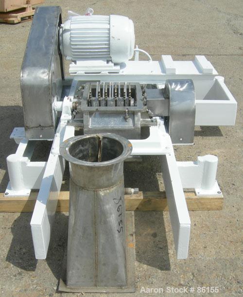 Used Fitzpatrick Fitzmill, Model FASO12, Stainless Steel. 24 fixed impact/knife blades. 13" x 11" cutting chamber, no feed throat. Driven by a 30 HP, 3/60/230/460 Volt, 3520 RPM motor. Mounted on a c...
