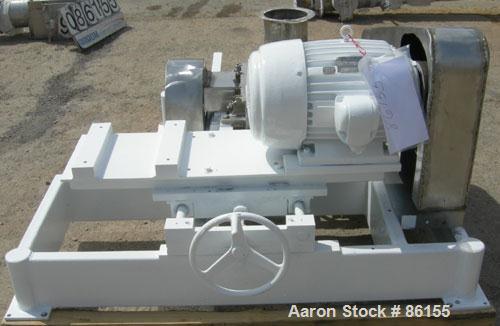 Used Fitzpatrick Fitzmill, Model FASO12, Stainless Steel. 24 fixed impact/knife blades. 13" x 11" cutting chamber, no feed throat. Driven by a 30 HP, 3/60/230/460 Volt, 3520 RPM motor. Mounted on a c...