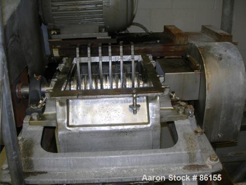 Used Fitzpatrick Fitzmill, Model FASO12, Stainless Steel. 24 fixed impact/knife blades. 13" x 11" cutting chamber, no feed throat. Driven by a 30 HP, 3/60/230/460 Volt, 3520 RPM motor. Mounted on a c...