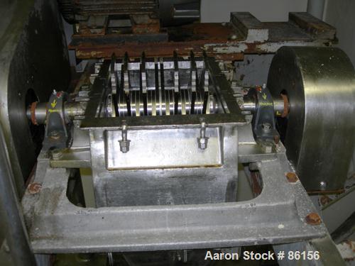 Used Fitzpatrick Fitzmill, Model FASO12, Stainless Steel. 24 fixed impact/knife blades. 13" x 11" cutting chamber, no feed throat. Driven by a 30 HP, 3/60/230/460 Volt, 3520 RPM motor. Mounted on a c...