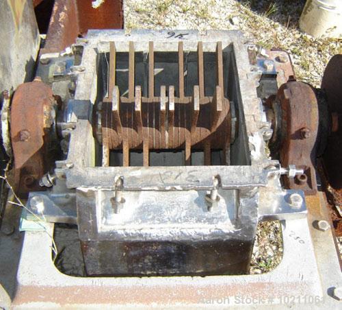 Used Fitzmill Comminuter Hammermill,  Model Code FASO12. Stainless steel construction. Unit is missing cover on mill. Mill does freely rotate but needs to be rebuilt. Existing motor is 20 hp, 3510 rp...