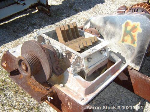 Used Fitzmill Comminuter Hammermill,  Model Code FASO12. Stainless steel construction. Unit is missing cover on mill. Mill does freely rotate but needs to be rebuilt. Existing motor is 20 hp, 3510 rp...