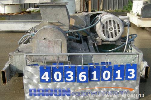 Used Fitzpatrick Fitzmill, Model FASO12, 316 Stainless Steel. (24) 410 Stainless steel fixed double knife blades. 11" x 13" jacketed cutting chamber, bottom screen. Gravity fed feed throat, water coo...