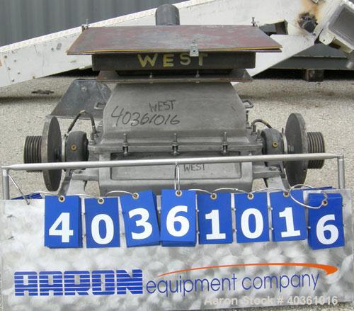 Used Fitzpatrick Fitzmill, model FASO20, 304 stainless steel. (48) stainless steel fixed double knife blades. 20" x 22" cutting chamber, bottom screen. Gravity fed feed throat. Unit requires motor an...