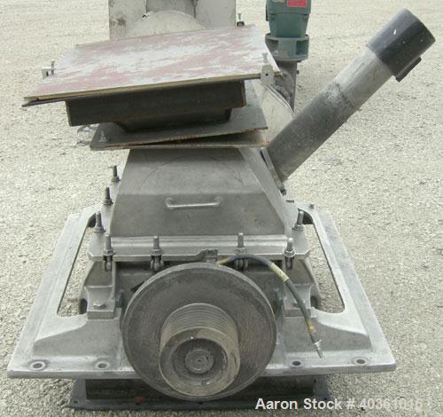Used Fitzpatrick Fitzmill, model FASO20, 304 stainless steel. (48) stainless steel fixed double knife blades. 20" x 22" cutting chamber, bottom screen. Gravity fed feed throat. Unit requires motor an...
