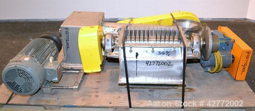 Used Fitzpatrick Fitzmill, Model FASO20, 316 Stainless Steel. (48) Knife/Impcat fixed 410/16/20 stainless steel blades, 15" x 20" cutting chamber, gravity feed hopper with a side mounted tubular 304 ...