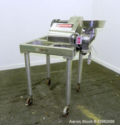 Used Fitzpatrick Homoloid Mill, Model JT, 316 Stainless Steel. 7-1/2'' Diameter x 2'' deep chamber, (12) 410/16/20 stainless steel swinging impact/knife blades. Bottom screen. Top 304 stainless steel...