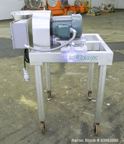 Used Fitzpatrick Homoloid Mill, Model JT, 316 Stainless Steel. 7-1/2'' Diameter x 2'' deep chamber, (12) 410/16/20 stainless steel swinging impact/knife blades. Bottom screen. Top 304 stainless steel...