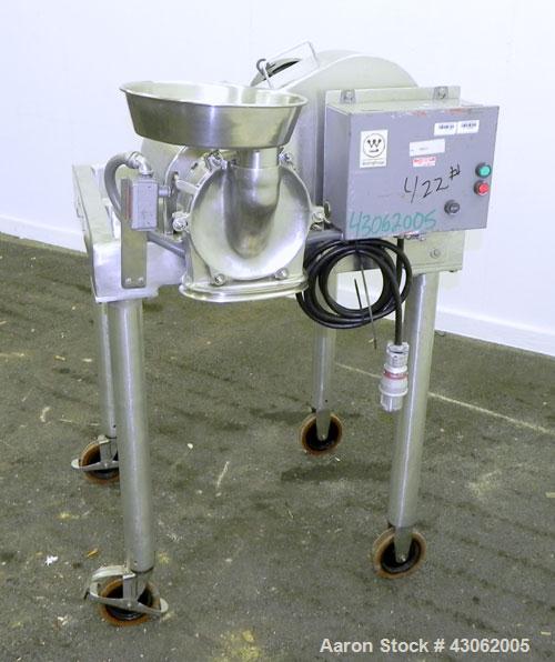 Used Fitzpatrick Homoloid Mill, Model JT, 316 Stainless Steel. 7-1/2'' Diameter x 2'' deep chamber, (12) 410/16/20 stainless steel swinging impact/knife blades. Bottom screen. Top 304 stainless steel...
