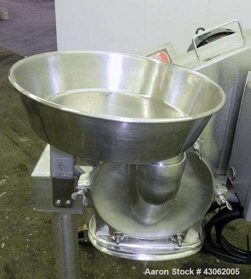 Used Fitzpatrick Homoloid Mill, Model JT, 316 Stainless Steel. 7-1/2'' Diameter x 2'' deep chamber, (12) 410/16/20 stainless steel swinging impact/knife blades. Bottom screen. Top 304 stainless steel...