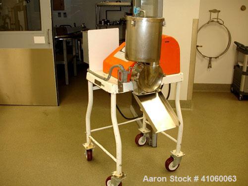 Used Fitzpatrick Homoloid Fitzmill, Model JT, stainless steel construction, gravity feed with hopper, swinging hammers on base with 
approximately 3 hp motor, serial #1294.