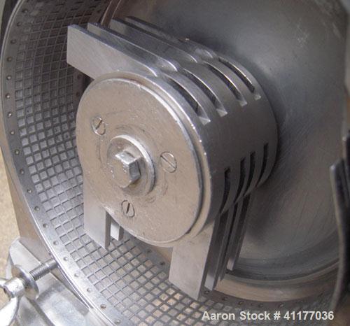 Used Fitzpatrick Homoloid Mill, Model JT, 304 stainless steel. 8'' diameter x 2'' deep chamber, (12) 410 stainless steel swinging double impact blades, bottom screen. Top feed, no pan. Driven by a 5 ...