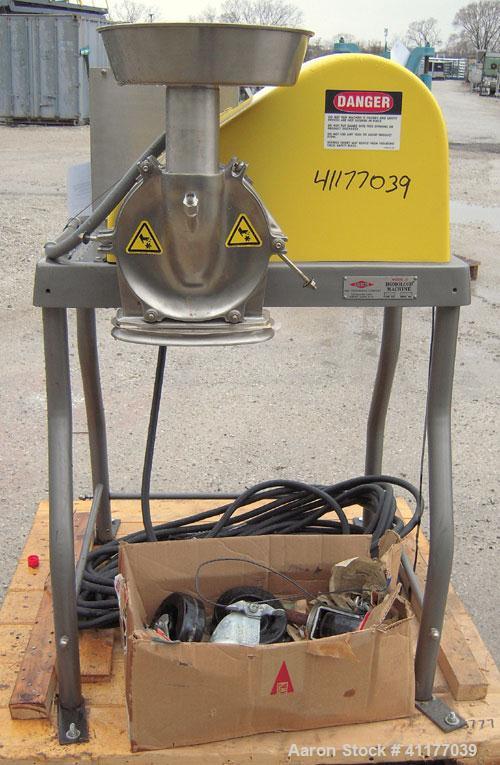 Used Fitzpatrick Homoloid Mill, Model JT, 316 stainless steel. 8'' diameter x 2'' deep chamber, (12) 410 stainless steel swinging impact/knife blades, no bottom screen. Top feed with pan. Driven by a...