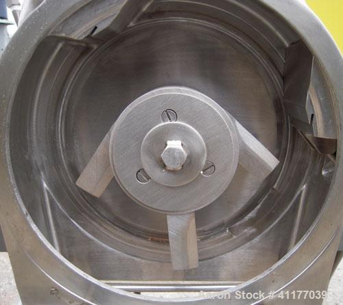 Used Fitzpatrick Homoloid Mill, Model JT, 316 stainless steel. 8'' diameter x 2'' deep chamber, (12) 410 stainless steel swinging impact/knife blades, no bottom screen. Top feed with pan. Driven by a...