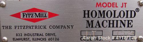Used Fitzpatrick Homoloid Mill, Model JT, 316 stainless steel. 8'' diameter x 2'' deep chamber, (12) 410 stainless steel swinging impact/knife blades, no bottom screen. Top feed with pan. Driven by a...