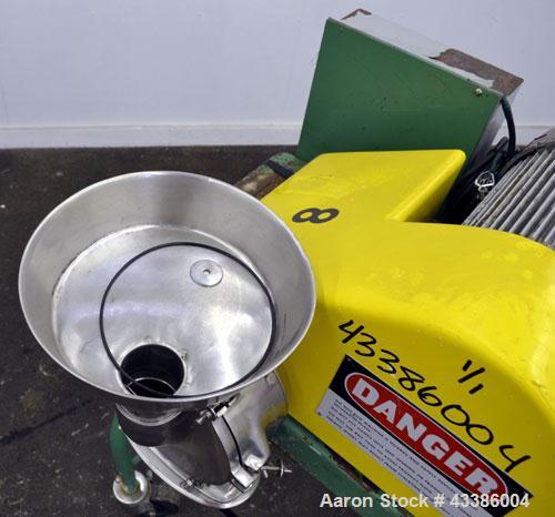 Used Fitzpatrick Homoloid Mill, Model JT, 316 Stainless Steel. 8” Diameter x 2” deep chamber, (11) 410/16/20 Stainless steel swinging impact/knife blades, bottom screen. 304 Strainless steel top feed...