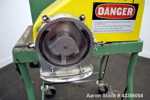 Used Fitzpatrick Homoloid Mill, Model JT, 316 Stainless Steel. 8” Diameter x 2” deep chamber, (11) 410/16/20 Stainless steel swinging impact/knife blades, bottom screen. 304 Strainless steel top feed...