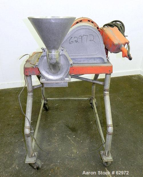 Used Fitzmill Homoloid Mill, Model JT, 316 Stainless Steel. 8" Diameter x 2" deep cutting chamber (missing rotor and cutting knives). 3" Feed opening with hopper, 7-1/2" x 2" bottom discharge. Driven...