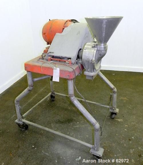 Used Fitzmill Homoloid Mill, Model JT, 316 Stainless Steel. 8" Diameter x 2" deep cutting chamber (missing rotor and cutting knives). 3" Feed opening with hopper, 7-1/2" x 2" bottom discharge. Driven...
