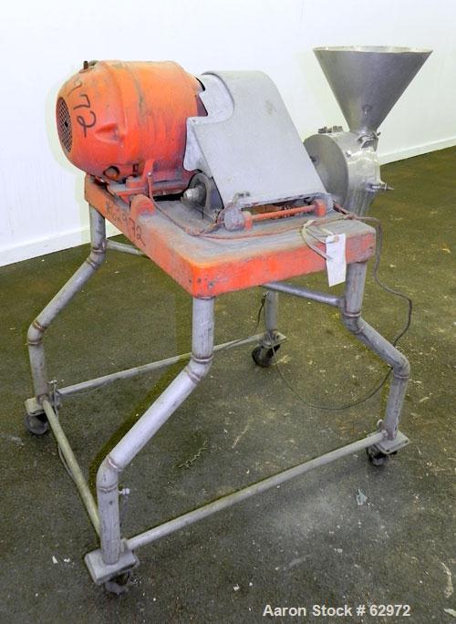 Used Fitzmill Homoloid Mill, Model JT, 316 Stainless Steel. 8" Diameter x 2" deep cutting chamber (missing rotor and cutting knives). 3" Feed opening with hopper, 7-1/2" x 2" bottom discharge. Driven...