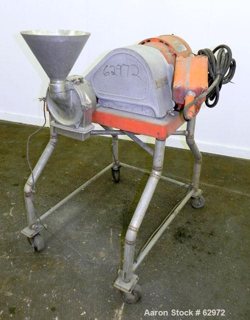 Used Fitzmill Homoloid Mill, Model JT, 316 Stainless Steel. 8" Diameter x 2" deep cutting chamber (missing rotor and cutting knives). 3" Feed opening with hopper, 7-1/2" x 2" bottom discharge. Driven...