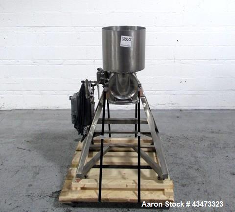 Used Fitzpatrick Homoloid Mill, Model J. Stainless steel product contact surfaces, fixed knives, gravity feed, on stand with direct coupled 3hp, 230/460 volt XP motor. Serial# J-1034.