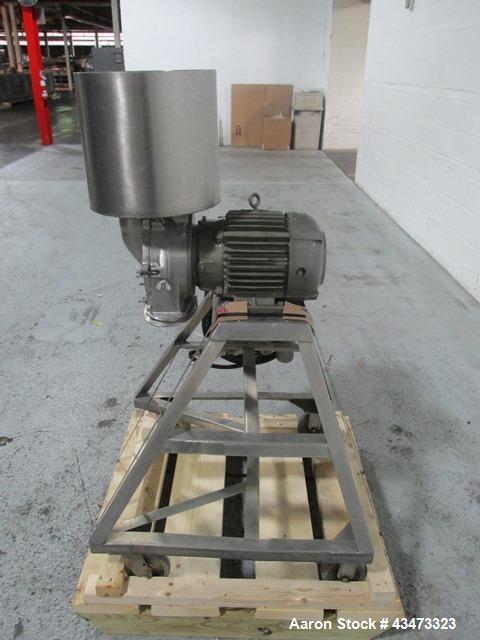 Used Fitzpatrick Homoloid Mill, Model J. Stainless steel product contact surfaces, fixed knives, gravity feed, on stand with direct coupled 3hp, 230/460 volt XP motor. Serial# J-1034.