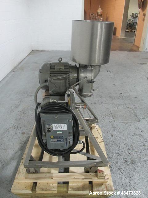 Used Fitzpatrick Homoloid Mill, Model J. Stainless steel product contact surfaces, fixed knives, gravity feed, on stand with direct coupled 3hp, 230/460 volt XP motor. Serial# J-1034.